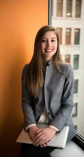 shallow focus photo of woman in gray jacket